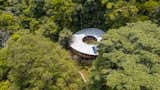 When the residents of Sinfonía Verde bought their property in 2002, they had expected to spend most of their time on the beach. But the land changed in the twenty years since the initial purchase, and—drawn to the sounds of the regenerating rainforest—they found themselves spending more and more time inland. They asked Ben Saxe to design a house immersed in the canopy because of the studio’s "beautiful designs that work with the environment rather than against it," the clients say.