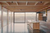 The Australian architecture firm Archier workshopped Candour by designing the Taroona House: a two-bedroom, two-bathroom plan with a detached art studio that uses a lightweight timber structure as its framing and is encompassed by floor-to-ceiling glass walls. With a fully realized platform in place, Taroona House was succeeded by Yandoit House (pictured above)—the first fully prefabricated home using Candour’s design software, prefab system, and manufacturing facility.